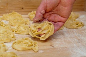 Making cartellate Christmas pastries by hand