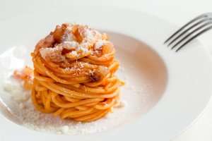 A delicious plate of pasta all'amatriciana, a classic Roman pasta dish.
