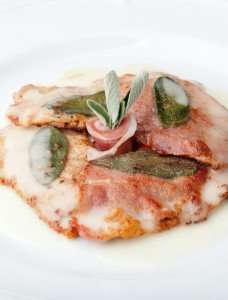 Saltimbocca alla romana, veal with prosciutto and sage, cooked in a wine sauce.