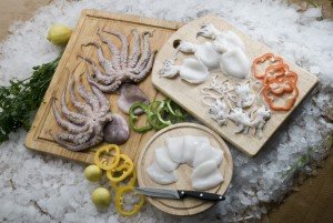 An assortment of raw fish on a culinary tour