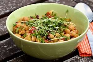 Enjoying a chickpea salad during a Fourth of July cookout.