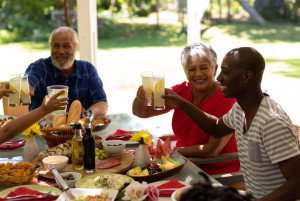 Enjoying traditional American fourth of July food with family and friends