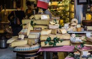 Exploring French cheeses in a cooking vacation.