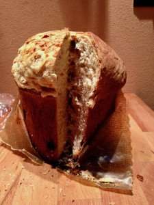 Slicing delicious homemade panettone bread for Christmas.