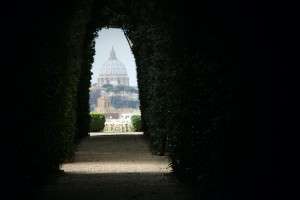 Peering through the keyhole of the Knights of Malta on the Aventine Hill, looking towards Saint Peter's Basilica.