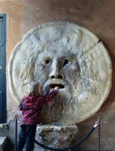 Tempting fate at La Bocca della Verita in Rome. 