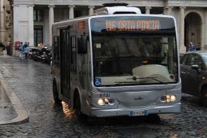 Taking a bus to get around Rome.