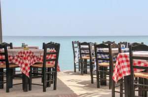 A tavern by the sea on the island of Crete, experienced during our Greece culinary vacations.