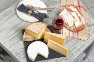 French cheese with a glass of red wine.