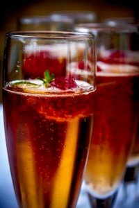 Champagne cocktail with raspberries on a cooking vacation in Spain