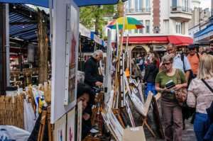 Strolling along the street in the Montmartre neighbordhood in Paris.