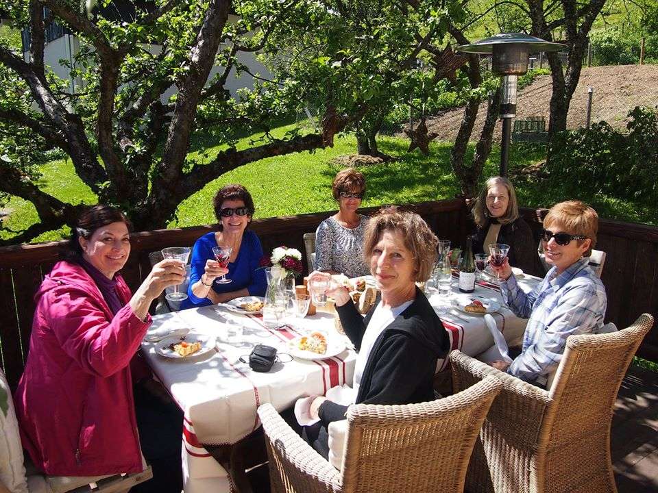 Enjoying lunch outside on a France cooking vacation with The International Kitchen.