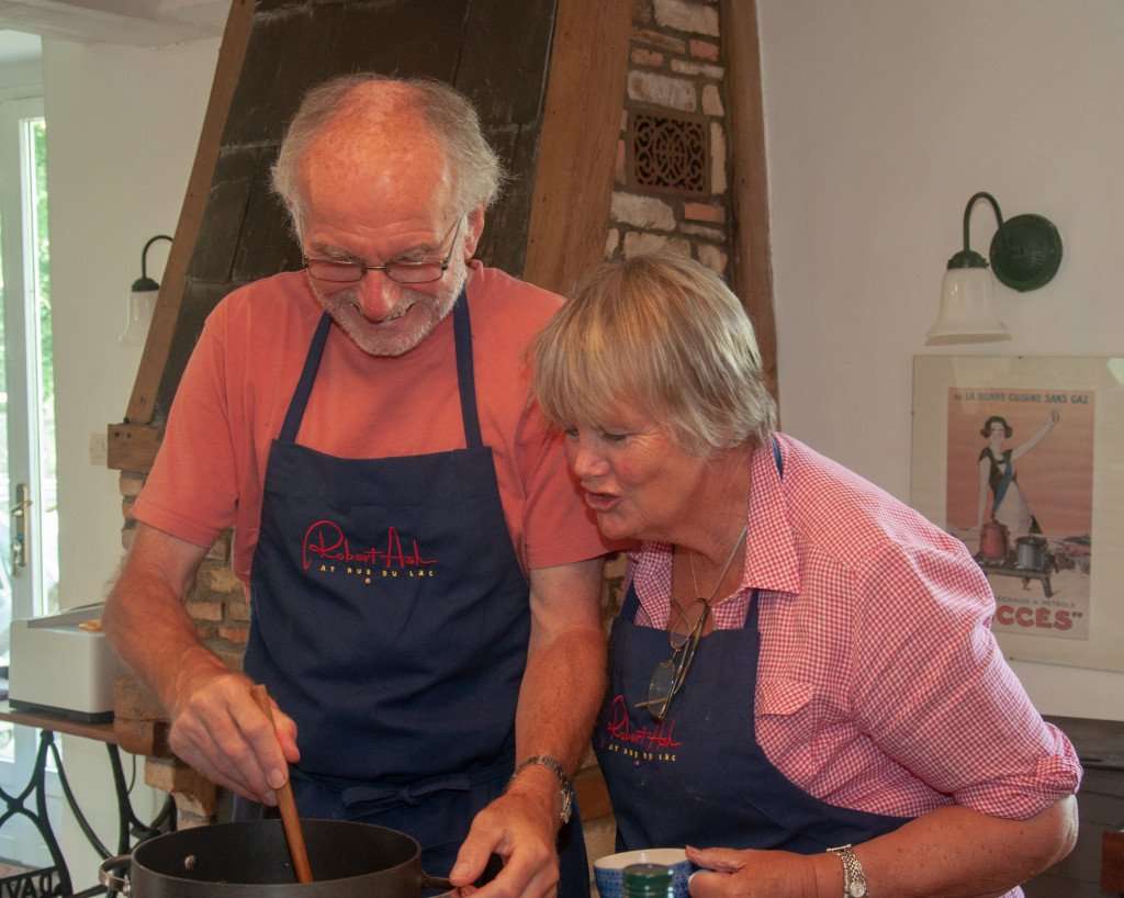 Cooking together during a cooking vacation and wine tour in Burgundy with The International Kitchen.