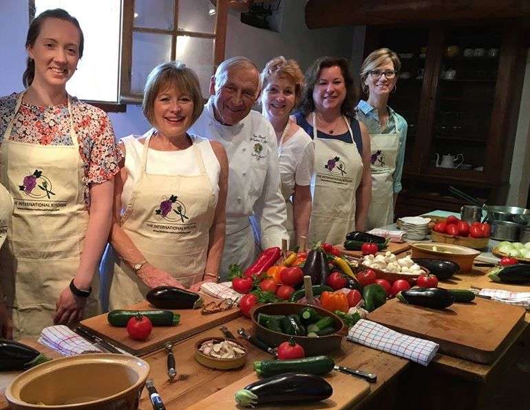 Cooking with Chef Rene during a culinary vacation in Provence.