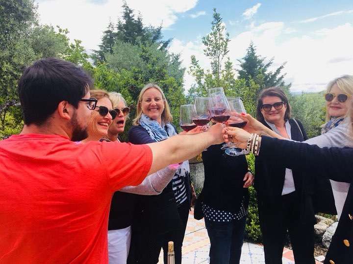 Toasting a great day spend on a culinary tour of Spain with The International Kitchen.