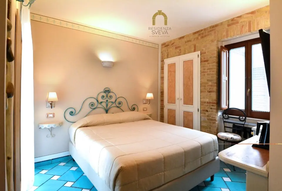 Image for A double room at the Residenza Sveva in Termoli, one of the B&Bs that form the Albergo Difuso of the town.
