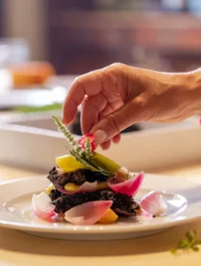 Plating a delicious dish during your cooking class.
