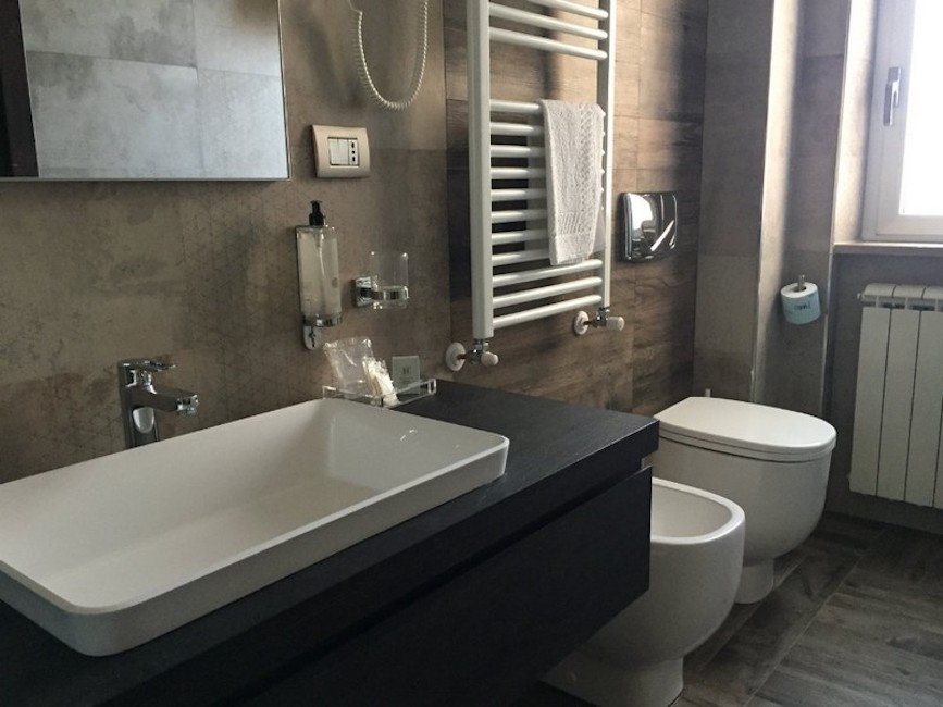 Image for Bathroom at Hotel San Marco, home during your culinary tour of Vasto, Abruzzo