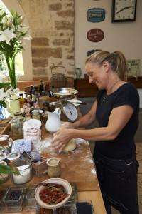 Chef Katherine at work during your cooking vacation in Burgundy.
