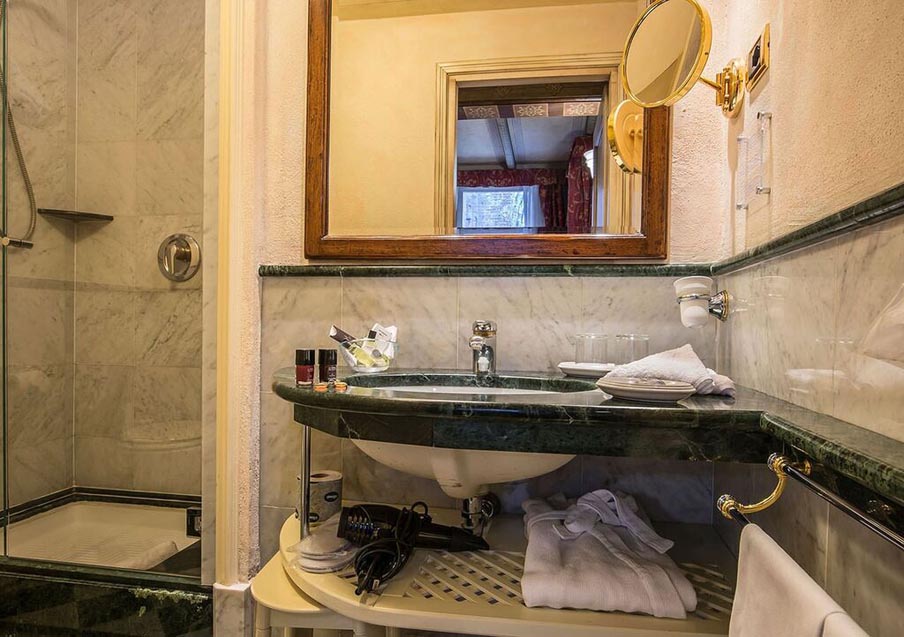 Image for Bathroom at Hotel Commercianti during your culinary vacation in Bologna