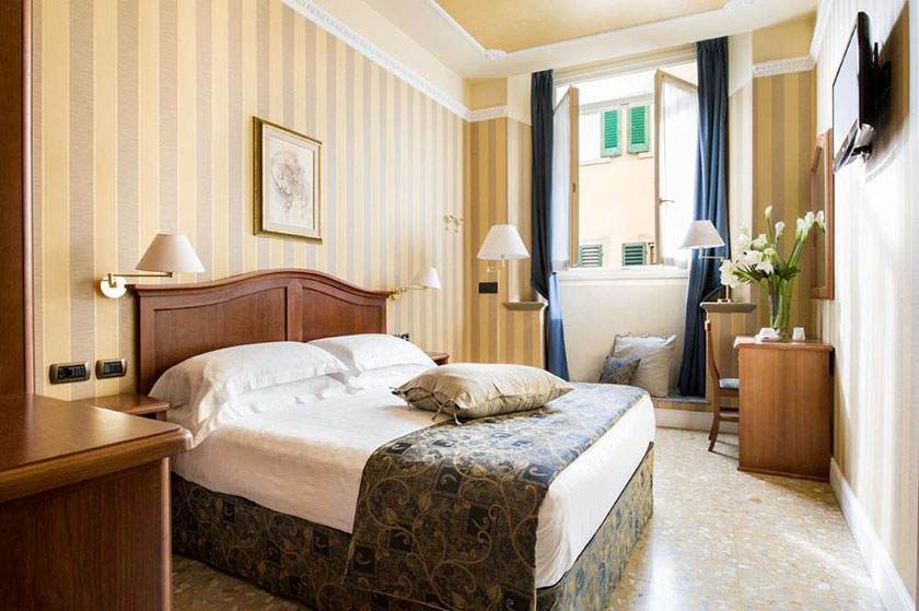 Image for Bedroom at the hotel Silla on your Florence culinary tour