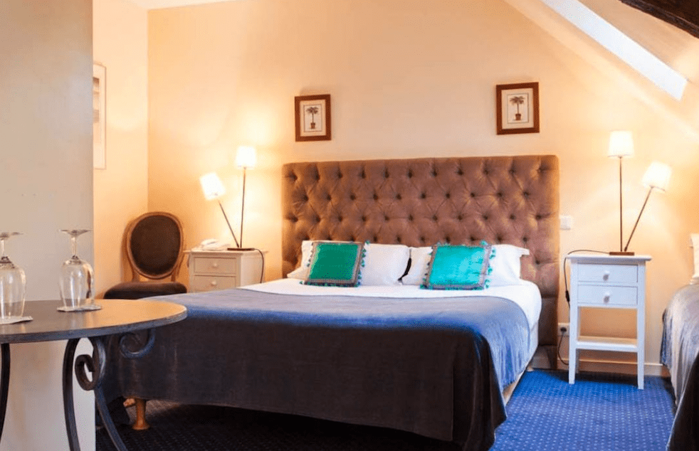Image for Blue bedroom at the 4* Clos d'Amboise, home for your Loire Valley wine tour.