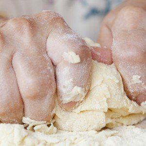 Kneading dough during a cooking class
