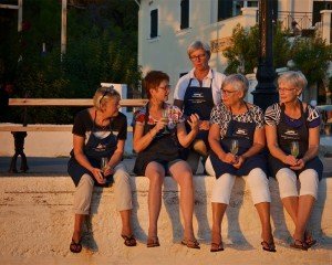 Relaxing with a glass of wine during your culinary vacation in Greece