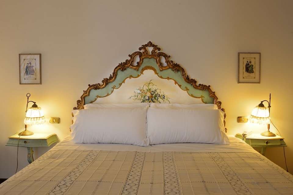 Image for A deluxe bedroom at the Villa Luppis.