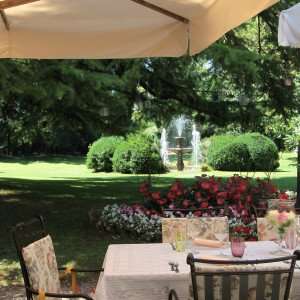 Enjoying the terrace of the villa Luppis during your culinary tour of Italy.