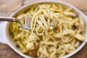 Enjoying a plate of pasta on a culinary tour of Italy.