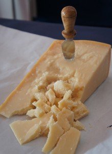 Board of parmigiano cheese during your cooking vacation in Italy