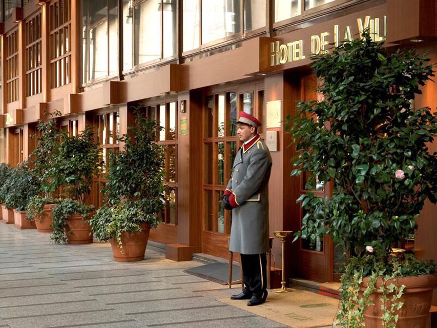 Image for Doorman at Hotel de la Ville in Milan during a culinary tour of Italy