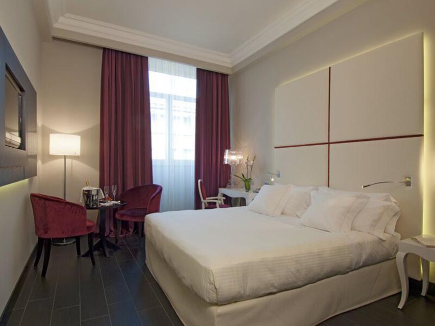 Image for Classic bedroom at Hotel de la Ville in Milan during a culinary tour of Italy