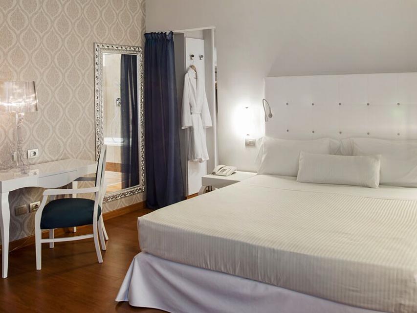Image for Bedroom at Hotel de la Ville in Milan during a culinary tour of Italy