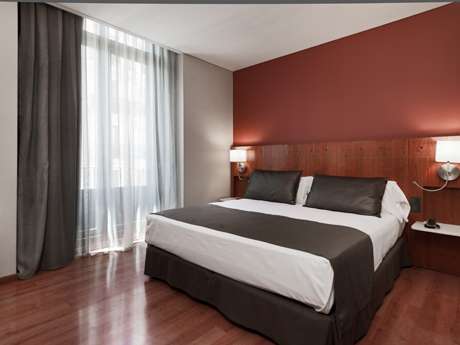 Image for Bedroom at hotel in Madrid for your cooking vacation in Spain