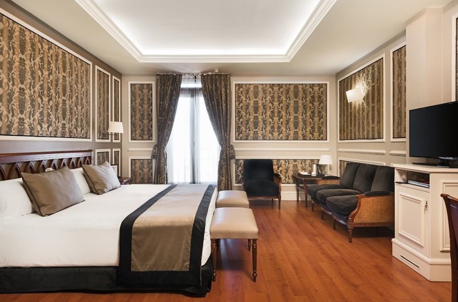 Image for Bedroom of Madrid hotel for your culinary tour of Spain