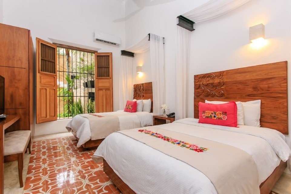 Image for Bedroom at the Hotel Casa las Palomas in Merida, Mexico.
