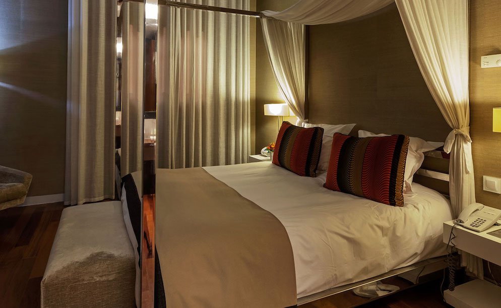 Image for Bedroom of the 5* hotel where you can stay on your culinary vacation in Portugal