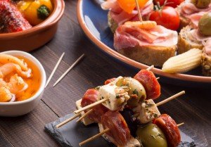 Mixed Spanish tapas on a culinary vacation in Spain