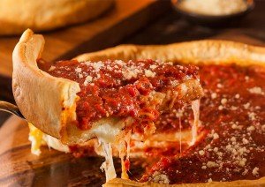 Deep dish Chicago style pizza enjoyed on Food Lover's Chicago culinary tour