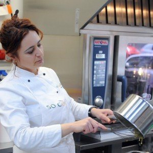 Chef Sabina leads a cooking class in Rome