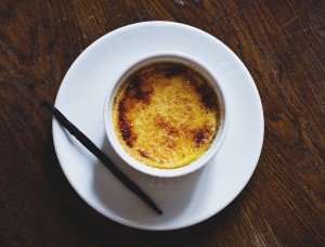 Delicious creme brulee on a French culinary vacation