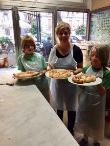 Enjoying pizza after a cooking class in Naples Italy