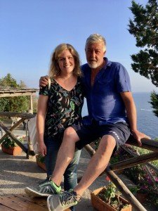 Old friends enjoying an evening at a local farm during an Amalfi Coast culinary vacation