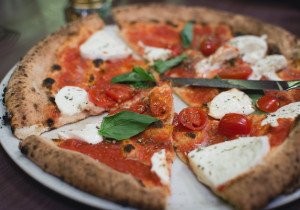 Italian pizza on a cooking vacation in Italy