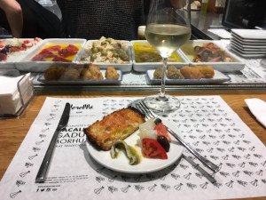 Traditional Catalan fish tapas enjoyed on a culinary tour of Barcelona