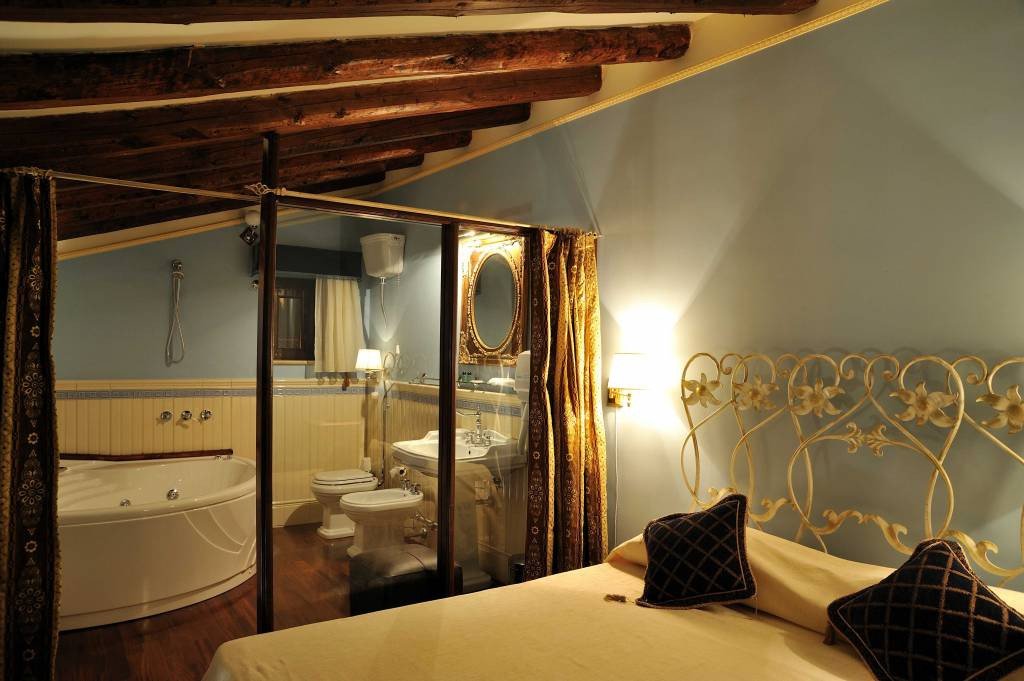 Image for Bedroom at Relais Briuccia on a Sicily cooking vacation