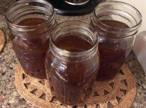 Jars of bone broth freshly made on foodie tours with TIK
