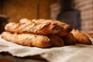 Freshly made baguettes on a France culinary vacation.